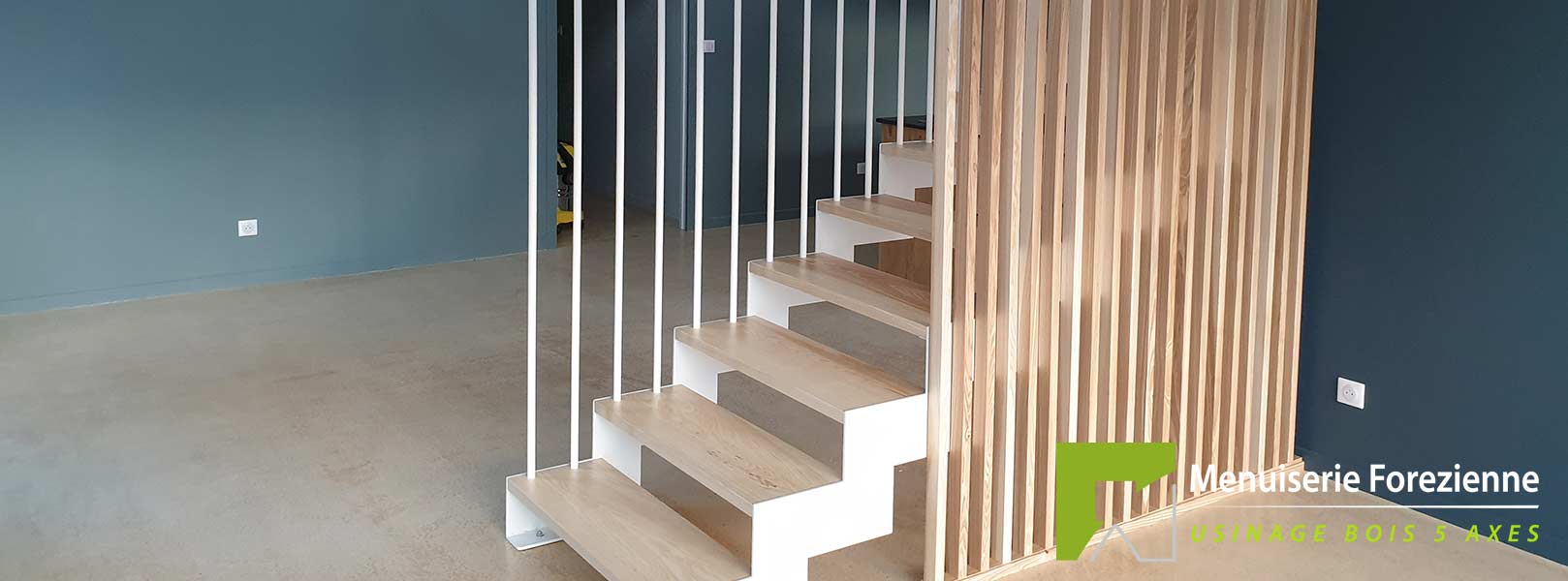 Fabrication d'escalier suspendu en bois et métal